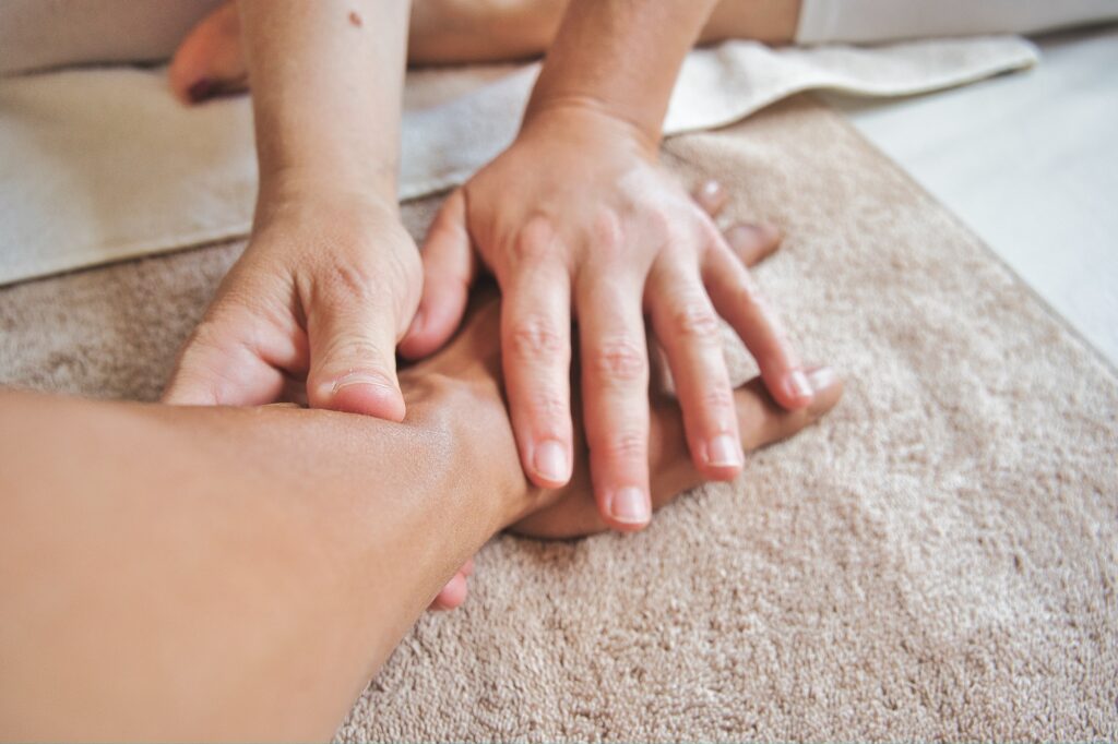 Massage on your wrist - Helen Clarke Massage, photo by Conscious Design on Unsplash